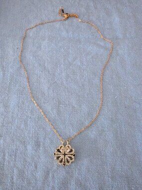 Gold necklace with sparkly hearts